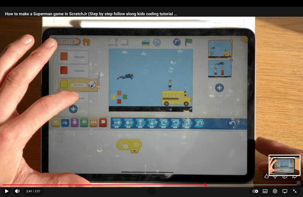 The block code for the yellow joypad button in the ScratchJr Superman Game Project.